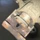 The piston on this caliper would not retract and was actually touching the rotor; the pad was missing.