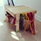 You can also look for toys made especially for rabbits, like this step-stool with fun twine and blocks.