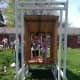 View from the door side of the coop/run. We had a wood screen door that we are repurposing as a door for the chicken run.