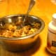 Add an enzyme and probiotics powdered supplement formulated for dogs before serving. Stir thoroughly. 