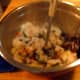 The potatoes are mashed and stirred into other veggies and meat. (Photo made before I stopped including rice.)