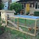 A chicken tractor with a coop attached