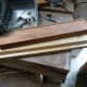 Scrap wood used for making slot for cat flap insulator to fit into.