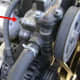 Power steering pump belt locking bolt.