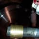 Pilot bushing on a bolt used to pop it out.