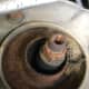 This is a strut mount that is missing the rubber bushings, it was hitting metal to metal on every bump.