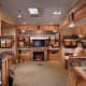 The interior of the 5th wheel above complete with double slide-outs and even a fireplace