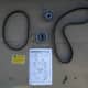 Timing belt component kit with new timing belt, balance shaft belt, and two idler pulleys.