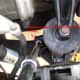 Remove the remaining lower motor mount bolts.
