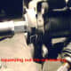 S. Begin squeezing out the old bearing