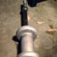 I. Screw the slide hammer onto the hub puller tool