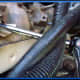 ...use an extension if necessary to seat the socket on the spark plug.