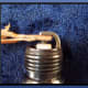 Slide the sandpaper between the arm and the electrode.