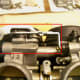 Remove the choke lever (circled in red).