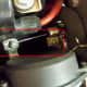 Remove choke cable (circled in red) .
