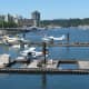 Float planes with Stanley Park in the background