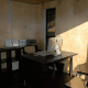 A simple, unadorned interior of a YardPod - great for small outdoor offices like this one.