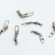 Brass fishing swivels. Because of its exposure to water, fishing tackle is frequently made of brass.