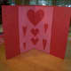 Then, when the card is opened, there will more hearts.