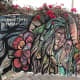 I liked how they integrated the wall mural into the rose bush that was growing. Simply beautiful