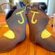 Use a hot glue gun to attach the cutouts to the boots.
