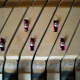 Two broken black keys put back in place, keys No. 58 and 60, repairs barely visible