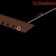 The hole will hold the tail of the thread from unwinding.