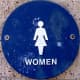 A female symbol usually means the restroom will have closed stalls for privacy, a baby station, and probably more handicap accessible facilities.