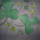 The colored in large and baby shamrocks are perfect for decorating windows and walls on Saint Patrick's Day.