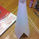 Wrap cardstock or construction paper into cyclinder shape and secure with tape.