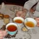 Tea is a must for any Victorian 1800s-themed tea party . . . even if you have to spike it!