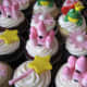 Pink birthday cupcakes.