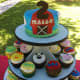 Barnyard-themed cupcake tower.
