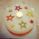 A birthday cake decorated with stars.