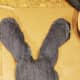Fill your bunny's head with poly beads to the desired level of plushness. Hot glue the two sections together to create a seam.