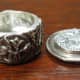 Fine silver lidded box - open, side view, shows mirror finished interior walls contrasting with textured exterior.