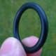O-ring probably made from nitrile rubber, a co-polymer of acrylonitrile and butadeine