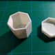 The Heptagonal Planter and its tray side by side.