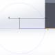 Placing the center of the Centerpoint Arc right on the Point we defined, then defining the radius by clicking on the lowest point of the part