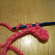 This is row 1 of a half double crochet.  Notice all 3 loops on the hook.