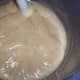 The mixture thickens to a pudding like consistency. The mixer leaves a trail (or trace) when its ready to pour into the mold