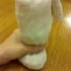 Fill with cotton balls up to heel of the sock to create the head of the snowman.