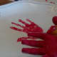 Paint your child's entire hand (after it's been washed!) with ceramic paint and press it firmly onto the platter. 