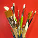 Some of my brushes, kept tip-up in a can.