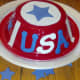 Use stars, stripes, and letters to decorate your patriotic hat.