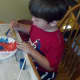 My son working hard on his coffee filter.