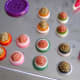 These are stacked button pairs with plastic flower cabochons waiting to be made into button hair pins.