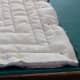 Pin the quilted sandwich to the backing fabric on three sides. leave one side open for the zip. Sew