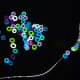 Stringing the melted Perler beads