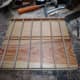 Runner strips glued in place in the slots cut in the side panels with the aid of the jig.